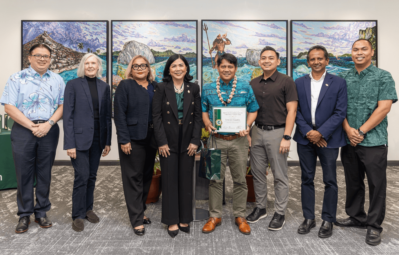 Faculty Award Recipients: University of Guam leaders and colleagues recognize Ernesto J. Guades, Associate Professor of Civil Engineering at the School of Engineering, as a first-quarter recipient of the Triton Outstanding Employee Award. From left: Joseph B. Gumataotao, Chief Human Resources Officer; Roseann Jones, Dean of the School of Business & Public Administration; Sharleen Santos-Bamba, Senior Vice President and Provost; UOG President Anita Borja Enriquez; Guades; Artemio “Ricky” Hernandez, Vice President for Administration and Finance and Chief Business Officer; Hiroshan Hettiarachchi, Dean of the School of Engineering; and Cris Czar Perez, UOG Employees Association president. Not pictured is second-quarter faculty award recipient Maria Claret Ruane, professor of economics at the School of Business & Public Administration. Photo courtesy of the University of Guam.